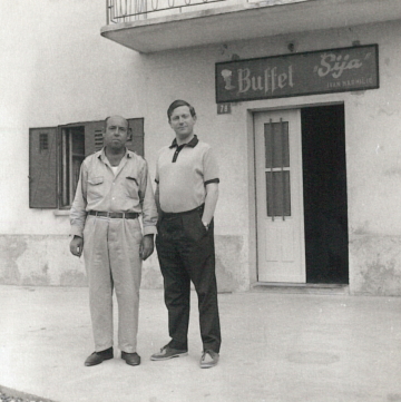 1960s. Jože Doričić [“Dottore”] with Tony Hurren in front of Buffet Šija in Žejane.